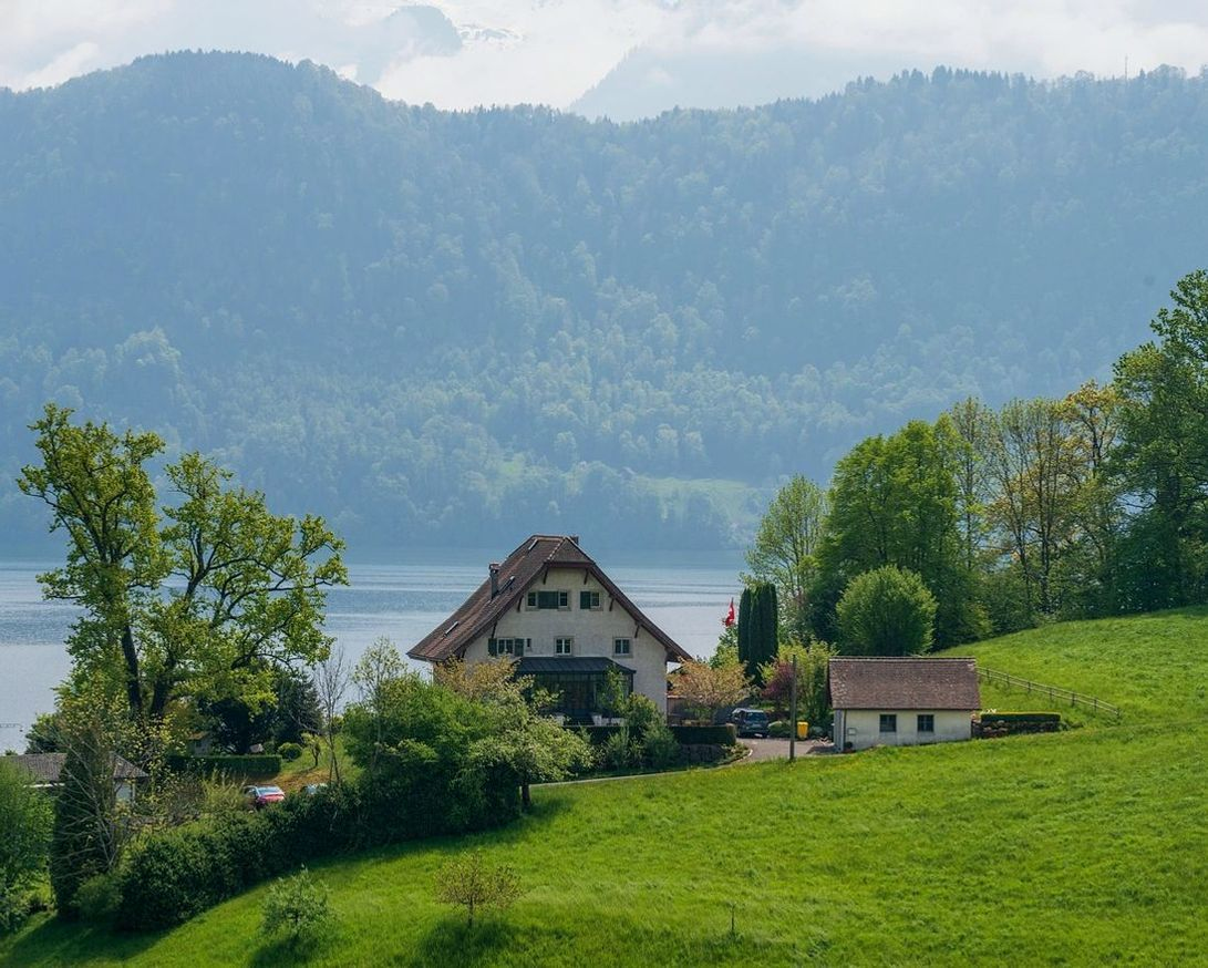 Cabins nestled by mountain lakes